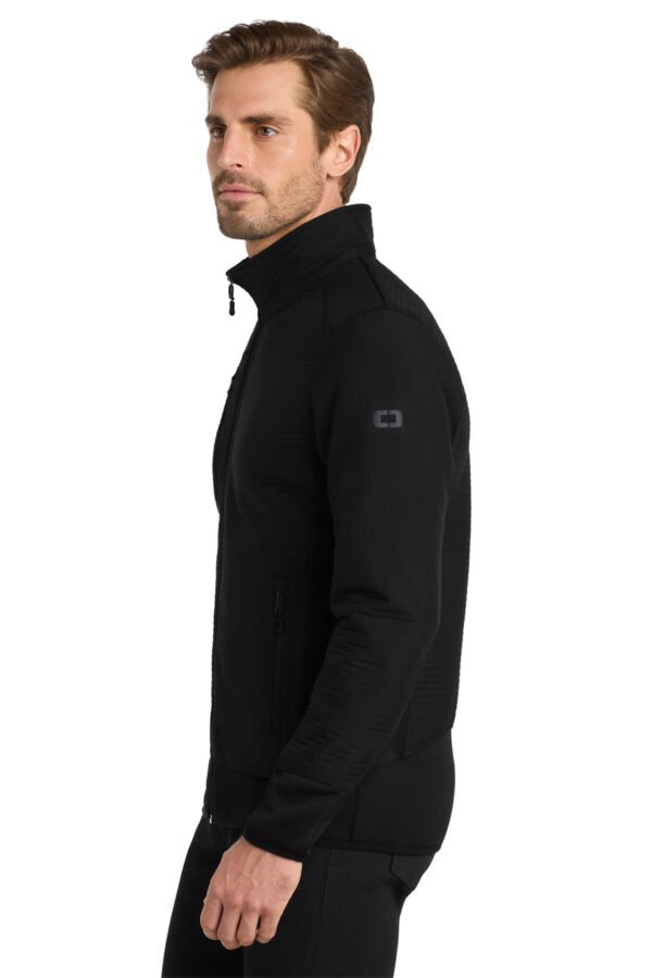 1200W-9007-Blacktop-4-OG726BlacktopModelSide4 OGIO ® Trax Jacket