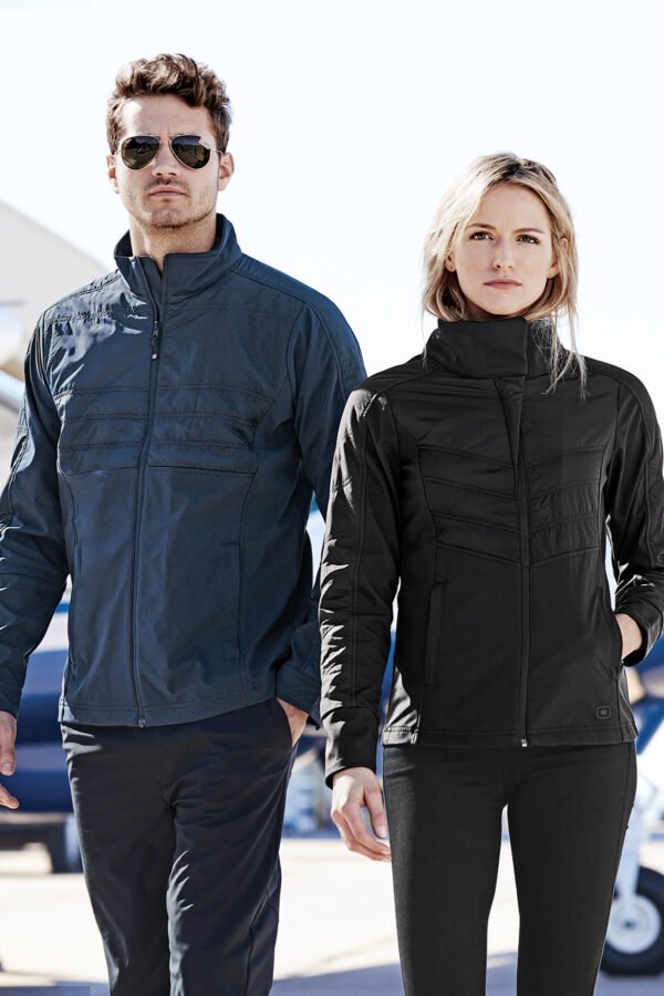 8312-Blacktop-7-LOE722BlacktopModelLifestyle1-1200W OGIO® Women's Brink Soft Shell